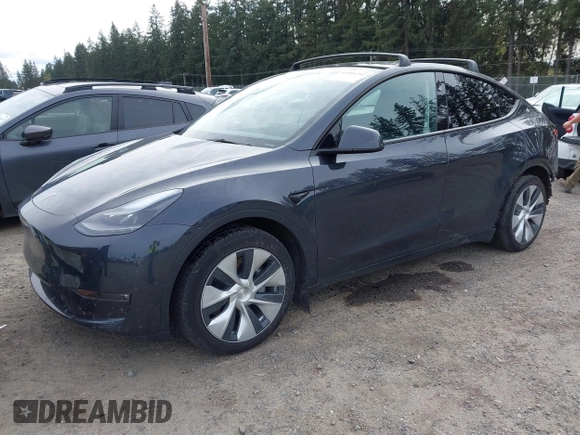 2024 Tesla Model Y Long Range with VIN 7SAYGAEE5RF981789, listed as a IAAI auction lot 41991292 with 21,103 mi miles. Bid and sale history available at carsss.com. Image 25.