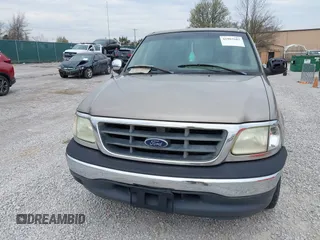 2001 Ford F-150 XLT with VIN 1FTRW07W01KB64001, listed as a IAAI auction lot 41903682 with 175,396 mi miles and . Bid and sale history available at DreamBid. Image 6.