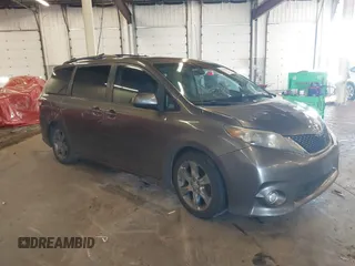 2011 Toyota Sienna SE with VIN 5TDXK3DC7BS034516, listed as a IAAI auction lot 41539955 with 209,309 mi miles. Bid and sale history available at carsss.com. Image 1.