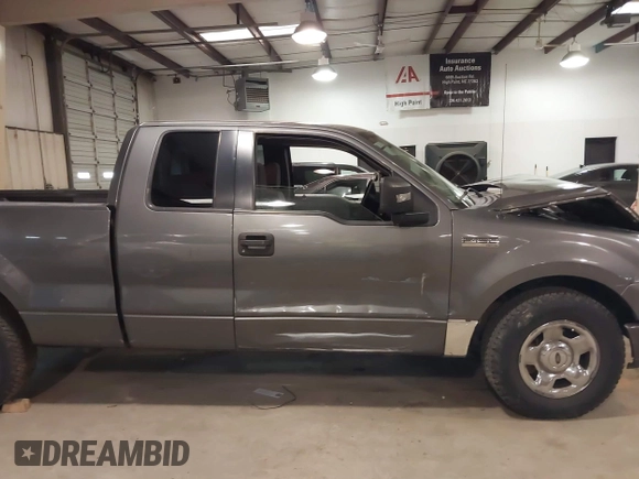 2005 Ford F-150 STX with VIN 1FTRX12W95NB38107, listed as a IAAI auction lot 41185100 with 201,171 mi miles. Bid and sale history available at carsss.com. Image 13.