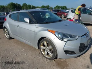 2014 Hyundai Veloster RE:FLEX with VIN KMHTC6AD6EU182632, listed as a IAAI auction lot 42661210 with 138,450 mi miles and . Bid and sale history available at DreamBid. Image 1.