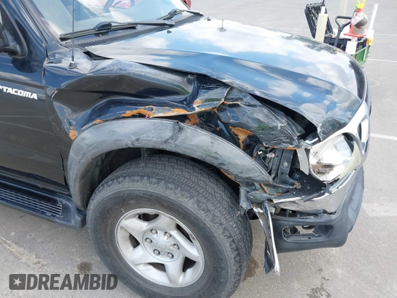 2003 Toyota Tacoma PreRunner z VIN 5TEGN92N03Z210194, wystawiony jako IAAI lot #42243037 z przebiegiem 241 047 mil mil oraz . Historia ofert i sprzedaży dostępna na DreamBid. Obrazek 6.
