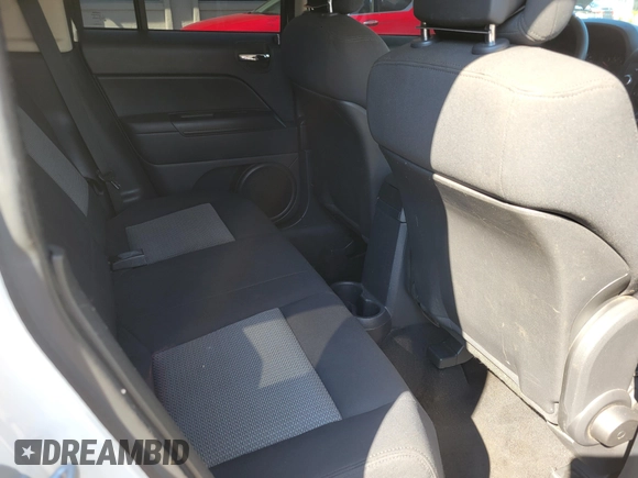 2010 Jeep Patriot Sport with VIN 1J4NT2GA7AD502905, listed as a IAAI auction lot 41705146 with 158,651 mi miles. Bid and sale history available at carsss.com. Image 8.