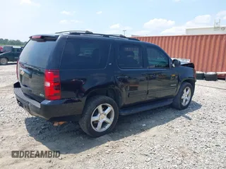 2012 Chevrolet Tahoe LT with VIN 1GNSCBE01CR130929, listed as a IAAI auction lot 42342129 with 234,628 mi miles and . Bid and sale history available at DreamBid. Image 4.