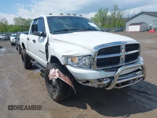 2004 Dodge 2500 SLT z VIN 3D7KU28D34G161515, wystawiony jako IAAI lot #42183633 z przebiegiem 166 467 mil mil oraz . Historia ofert i sprzedaży dostępna na DreamBid. Obrazek 1.