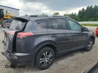 2017 Toyota RAV4 LE with VIN 2T3BFREV4HW591330, listed as a Copart auction lot 64726745 with 93,909 mi miles and Salvage title. Bid and sale history available at DreamBid. Image 3.