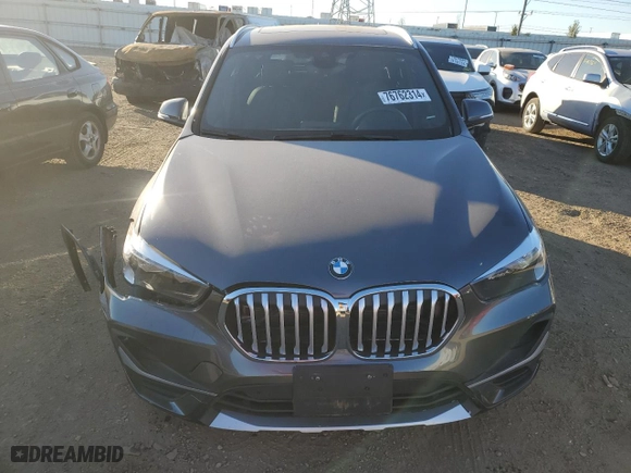 2022 BMW X1 xDrive28i with VIN WBXJG9C09N5U92203, listed as a Copart auction lot 76762314 with 16,780 mi miles and Salvage Title. Bid and sale history available at carsss.com. Image 5.