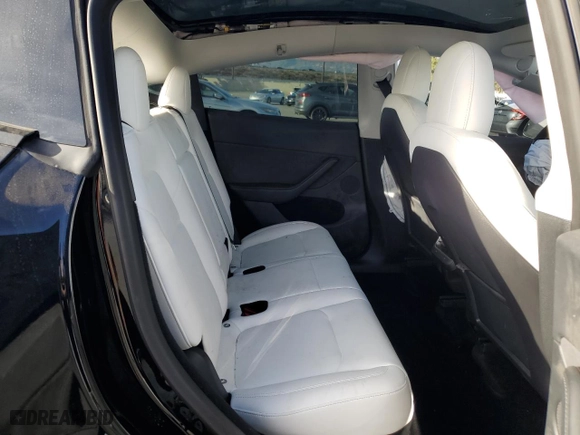 2023 Tesla Model Y Performance with VIN 7SAYGDEF6PF635595, listed as a Copart auction lot 88483825 with 0 mi miles and Salvage Title. Bid and sale history available at carsss.com. Image 11.