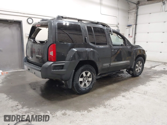 2012 Nissan Xterra S with VIN 5N1AN0NW2CC510402, listed as a IAAI auction lot 41722638 with 189,117 mi miles and . Bid and sale history available at DreamBid. Image 4.
