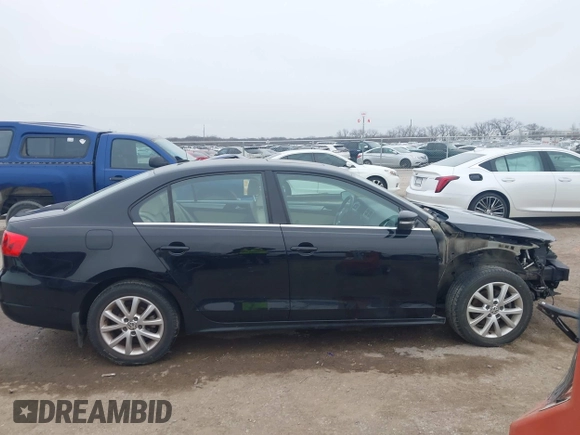2014 Volkswagen Jetta Sedan SE w/Connectivity with VIN 3VWD07AJ4EM370905, listed as a IAAI auction lot 41472856 with 146,662 mi miles. Bid and sale history available at carsss.com. Image 13.