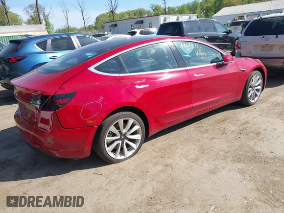 2018 Tesla Model 3 Long Range Battery z VIN 5YJ3E1EA3JF047287, wystawiony jako IAAI lot #42099771 z przebiegiem 120 470 mil mil oraz . Historia ofert i sprzedaży dostępna na DreamBid. Obrazek 4.