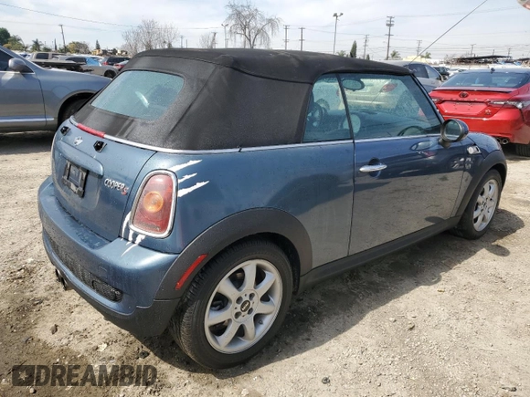 2010 MINI Convertible S with VIN WMWMS3C5XATY51076, listed as a Copart auction lot 48532735 with 104,901 mi miles and Clean title. Bid and sale history available at DreamBid. Image 3.