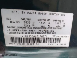 2000 Mazda MX-5 Miata with VIN JM1NB3536Y0150274, listed as a IAAI auction lot 41685970 with 128,492 mi miles. Bid and sale history available at carsss.com. Image 9.