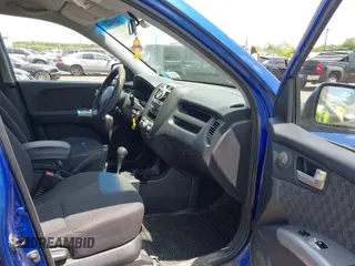 2007 Kia Sportage LX z VIN KNDJF723277303270, wystawiony jako IAAI lot #42388973 z przebiegiem 170 284 mil mil oraz . Historia ofert i sprzedaży dostępna na DreamBid. Obrazek 5.