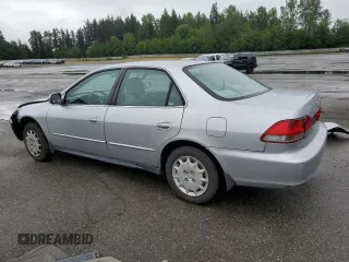 2002 Honda Accord LX z VIN 3HGCG56412G708628, wystawiony jako Copart lot #57347935 z przebiegiem 146 894 mil mil oraz Szkoda całkowita • Salvage title. Historia ofert i sprzedaży dostępna na DreamBid. Obrazek 2.