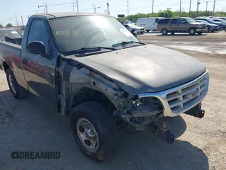 2003 Ford F-150 XL with VIN 1FTRF17273NB64646, listed as a IAAI auction lot 41986850 with 180,601 mi miles. Bid and sale history available at carsss.com. Image 6.