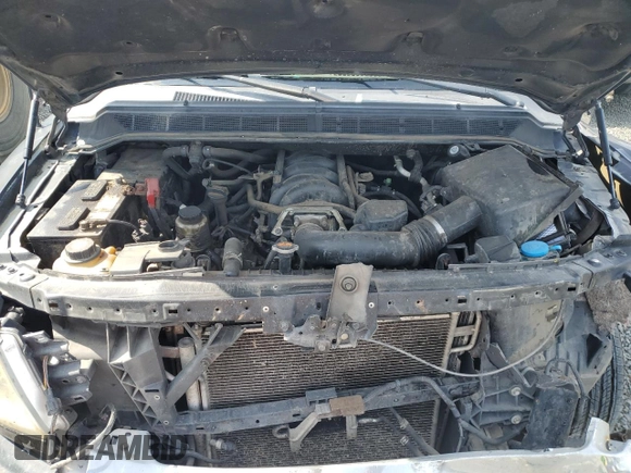 2012 Nissan Titan SV with VIN 1N6BA0ED3CN305384, listed as a Copart auction lot 56497905 with 331,174 mi miles and Salvage title. Bid and sale history available at DreamBid. Image 11.