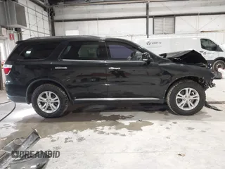 2013 Dodge Durango Crew with VIN 1C4SDJDT9DC670738, listed as a IAAI auction lot 41329419 with 149,520 mi miles and . Bid and sale history available at carsss.com. Image 14.