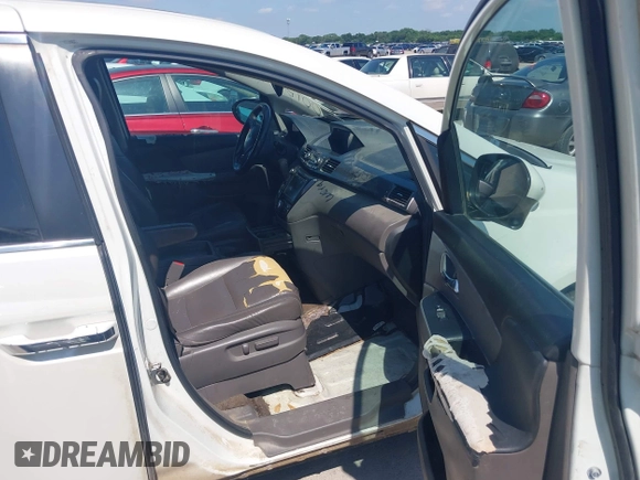 2014 Honda Odyssey EX-L z VIN 5FNRL5H61EB001509, wystawiony jako IAAI lot #42371539 z przebiegiem 259 195 mil mil oraz . Historia ofert i sprzedaży dostępna na DreamBid. Obrazek 5.