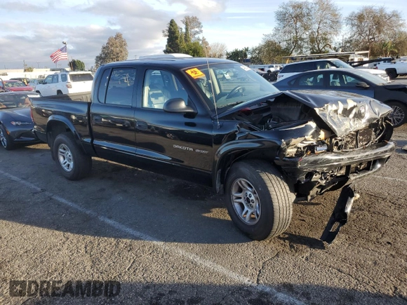 2002 Dodge Dakota Sport with VIN 1B7HG38N82S697439, listed as a Copart auction lot 44282155 with 239,414 mi miles and Salvage Title. Bid and sale history available at carsss.com. Image 4.