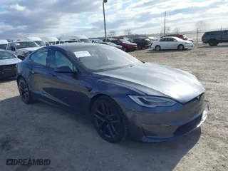 2021 Tesla Model S Plaid with VIN 5YJSA1E60MF455768, listed as a IAAI auction lot 41603504 with 27,398 mi miles. Bid and sale history available at carsss.com. Image 1.