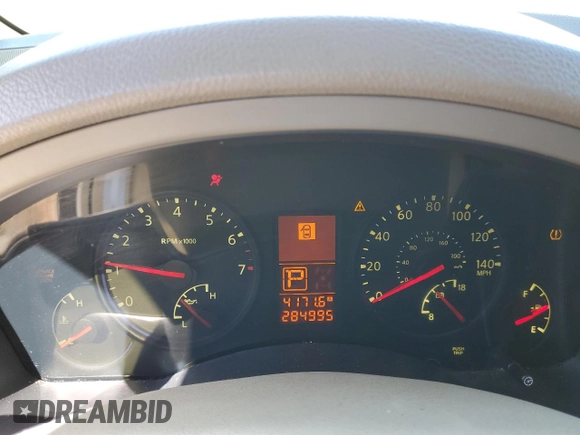 2010 Infiniti QX56 with VIN 5N3ZA0NF3AN905874, listed as a Copart auction lot 58995905 with 284,995 mi miles and Salvage title. Bid and sale history available at DreamBid. Image 9.