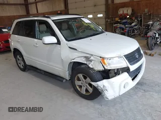 2009 Suzuki Grand Vitara z VIN JS3TD044294100168, wystawiony jako IAAI lot #42489252 z przebiegiem 152 679 mil mil oraz . Historia ofert i sprzedaży dostępna na DreamBid. Obrazek 1.