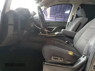 2015 Nissan Titan SL with VIN 1N6AA0ED1FN503994, listed as a Copart auction lot 39525224 with 104,353 mi miles and Salvage Title. Bid and sale history available at DreamBid. Image 7.