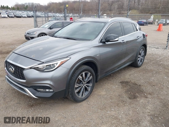 2017 Infiniti QX30 Premium z VIN SJKCH5CR2HA022260, wystawiony jako IAAI lot #42067553 z przebiegiem 85 301 mil mil oraz . Historia ofert i sprzedaży dostępna na DreamBid. Obrazek 17.