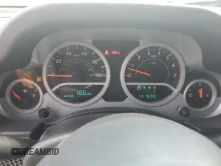 2008 Jeep Wrangler Unlimited Sahara с VIN 1J8GA59108L514034, выставлен на аукционе Copart как лот 58812215 с пробегом 191 800 миль миль и Списание • Salvage title. История ставок и продаж доступна на DreamBid. Изображение 9.