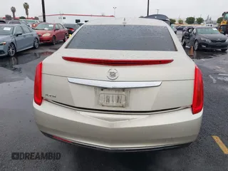 2013 Cadillac XTS z VIN 2G61N5S32D9127146, wystawiony jako IAAI lot #41578528 z przebiegiem 98 529 mil mil oraz . Historia ofert i sprzedaży dostępna na DreamBid. Obrazek 16.