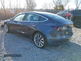 2020 Tesla Model 3 Long Range with VIN 5YJ3E1EB9LF795408, listed as a IAAI auction lot 41735428 with 56,013 mi miles. Bid and sale history available at carsss.com. Image 3.