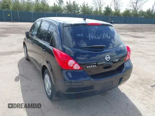 2012 Nissan Versa S with VIN 3N1BC1CP9CK290446, listed as a IAAI auction lot 41861756 with 124,883 mi miles. Bid and sale history available at carsss.com. Image 3.
