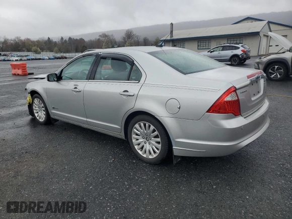 2010 Ford Fusion Hybrid z VIN 3FADP0L30AR122805, wystawiony jako Copart lot #52276255 z przebiegiem 146 073 mil mil oraz Szkoda całkowita • Salvage title. Historia ofert i sprzedaży dostępna na DreamBid. Obrazek 2.