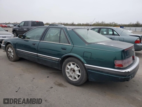 1997 Cadillac Seville Luxury SLS with VIN 1G6KS52YXVU816137, listed as a Copart auction lot 85664104 with 161,553 mi miles and Salvage Title. Bid and sale history available at carsss.com. Image 2.