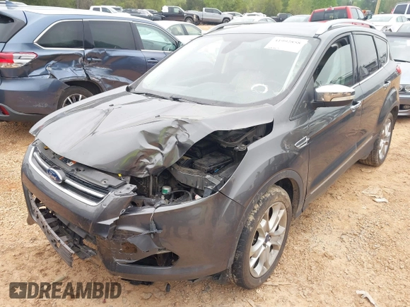 2015 Ford Escape Titanium with VIN 1FMCU9J90FUC14650, listed as a IAAI auction lot 41992858 with 158,963 mi miles and . Bid and sale history available at DreamBid. Image 6.