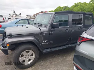 2016 Jeep Wrangler Unlimited Sahara z VIN 1C4HJWEG1GL252860, wystawiony jako IAAI lot #42215620 z przebiegiem 85 267 mil mil oraz . Historia ofert i sprzedaży dostępna na DreamBid. Obrazek 14.