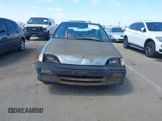 1994 Geo Metro z VIN 2C1MR2465R6726696, wystawiony jako IAAI lot #42053202 z przebiegiem 124 775 mil mil oraz . Historia ofert i sprzedaży dostępna na DreamBid. Obrazek 6.