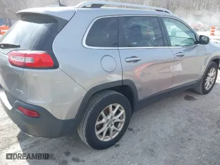 2016 Jeep Cherokee North with VIN 1C4PJMCS8GW115792, listed as a IAAI auction lot 41670422 with 141,450 mi miles. Bid and sale history available at carsss.com. Image 4.