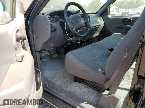 2003 Ford F-150 XL with VIN 2FTRX17293CA94389, listed as a Copart auction lot 65462825 with 165,638 mi miles and Clean title. Bid and sale history available at DreamBid. Image 8.