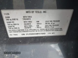 2021 Tesla Model Y Long Range z VIN 5YJYGDEE6MF070068, wystawiony jako IAAI lot #42224634 z przebiegiem 33 850 mil mil oraz . Historia ofert i sprzedaży dostępna na DreamBid. Obrazek 9.