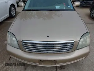 2005 Cadillac DeVille z VIN 1G6KD54Y25U129354, wystawiony jako IAAI lot #41930408 z przebiegiem 121 391 mil mil oraz . Historia ofert i sprzedaży dostępna na DreamBid. Obrazek 6.