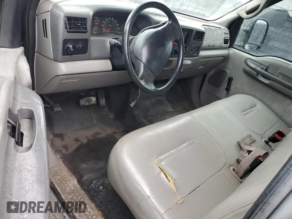 2000 Ford F-250 XL with VIN 1FTNX21F3YED35736, listed as a Copart auction lot 50309805 with 303,811 mi miles and Salvage title. Bid and sale history available at DreamBid. Image 8.