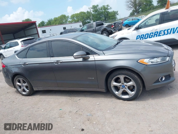 2013 Ford Fusion SE Hybrid с VIN 3FA6P0LU1DR267258, выставлен на аукционе IAAI как лот 42675187 с пробегом 184 121 миль миль и . История ставок и продаж доступна на DreamBid. Изображение 13.