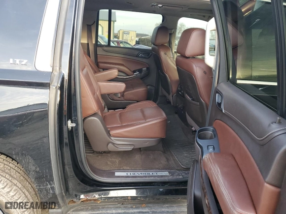 2015 Chevrolet Suburban LTZ with VIN 1GNSKKKC7FR127586, listed as a Copart auction lot 44049855 with 192,358 mi miles and Salvage Title. Bid and sale history available at carsss.com. Image 11.
