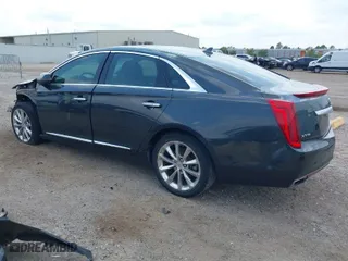 2013 Cadillac XTS Luxury with VIN 2G61P5S34D9103182, listed as a IAAI auction lot 40184614 with 183,014 mi miles. Bid and sale history available at carsss.com. Image 3.