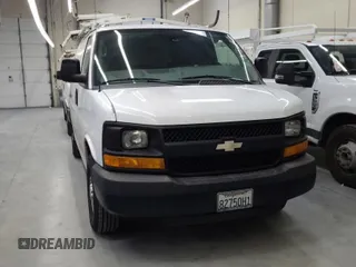 2013 Chevrolet Express Cargo Van with VIN 1GCWGFCAXD1142255, listed as a IAAI auction lot 42015373 with 194,897 mi miles. Bid and sale history available at carsss.com. Image 1.