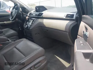 2015 Honda Odyssey Touring Elite with VIN 5FNRL5H90FB003506, listed as a IAAI auction lot 42585049 with 120,543 mi miles and . Bid and sale history available at DreamBid. Image 5.