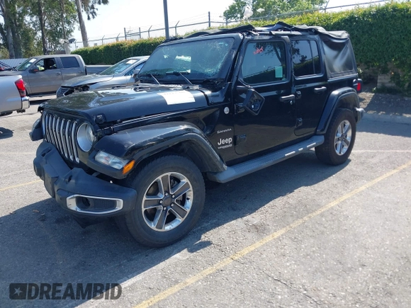 2018 Jeep Wrangler Unlimited Sahara with VIN 1C4HJXEN7JW328981, listed as a IAAI auction lot 42217508 with 59,584 mi miles and . Bid and sale history available at DreamBid. Image 2.