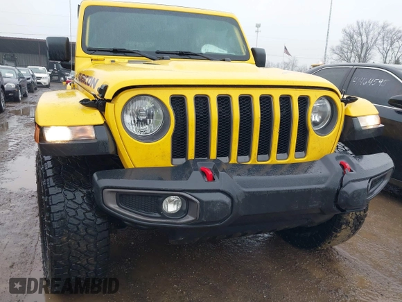 2020 Jeep Wrangler Unlimited Rubicon z VIN 1C4HJXFN7LW172944, wystawiony jako IAAI lot #41474893 z przebiegiem 76 726 mil mil oraz . Historia ofert i sprzedaży dostępna na DreamBid. Obrazek 6.